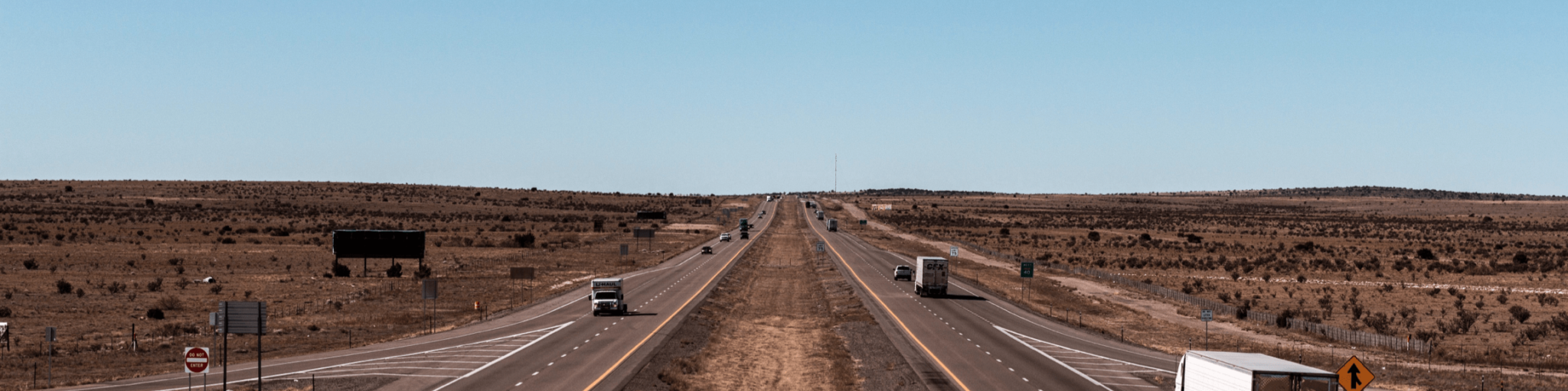 A highway surrounded by open land